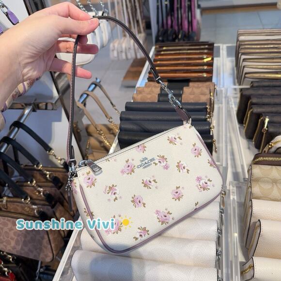 NWT COACH Nolita 19 Signature Canvas Floral Print Wristlet CAL24 Silver/Chalk